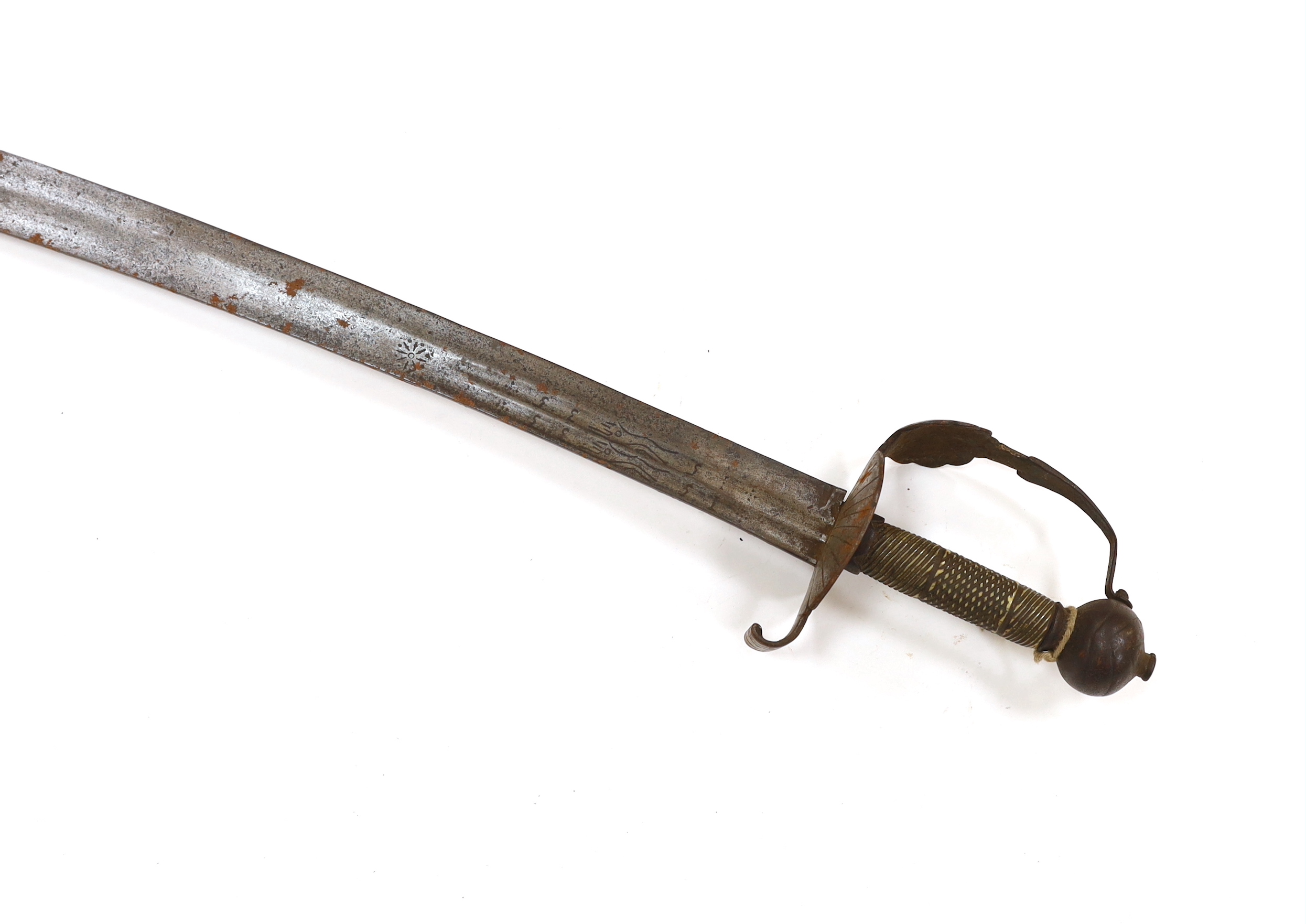 An English hangar, mid 17th century, curved fullered blade engraved with spurious date 1535 and running wolf mark, iron guard slightly reduced and swollen pommel, spirally carved and chequered bone grip, blade 67.5cm